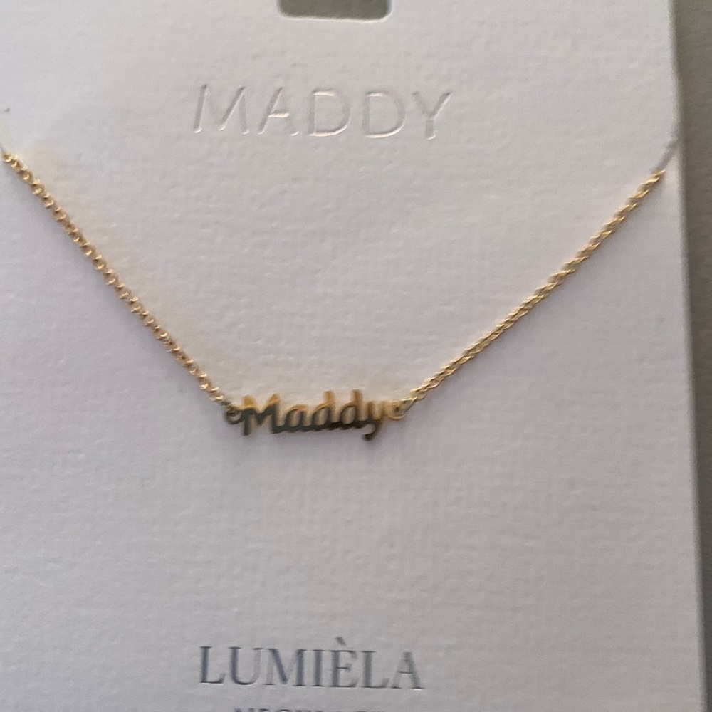 Gold necklace with Maddy spelled out